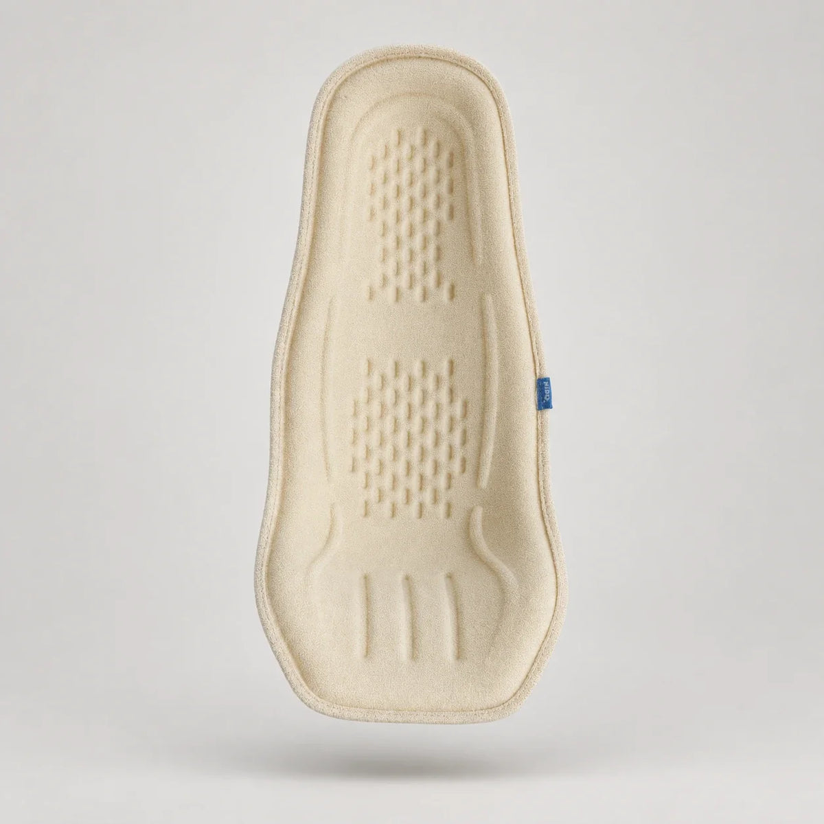 Front view of the Nido Pod showing two dimpled textile panels and curved channels